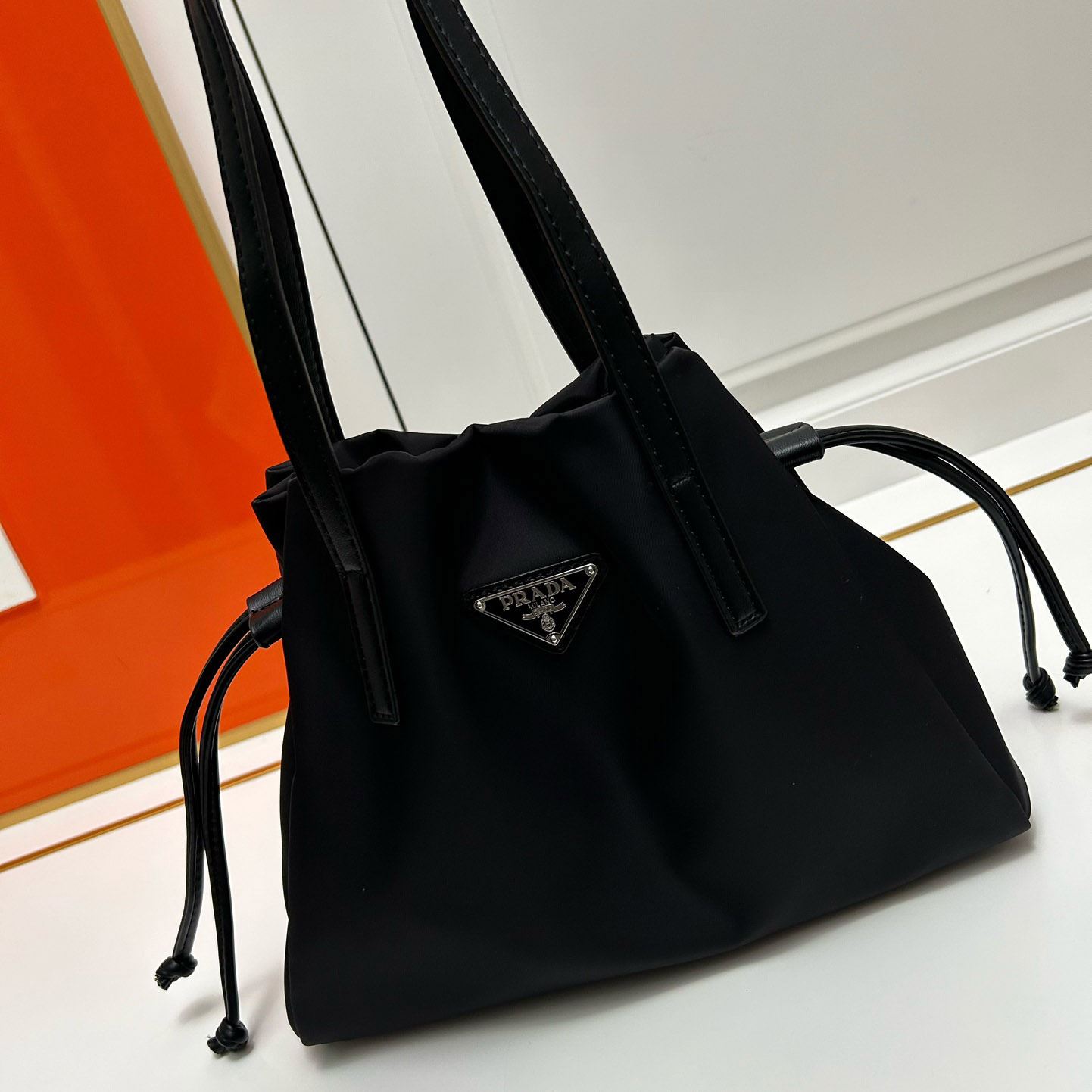 Pra*a top handle bags
